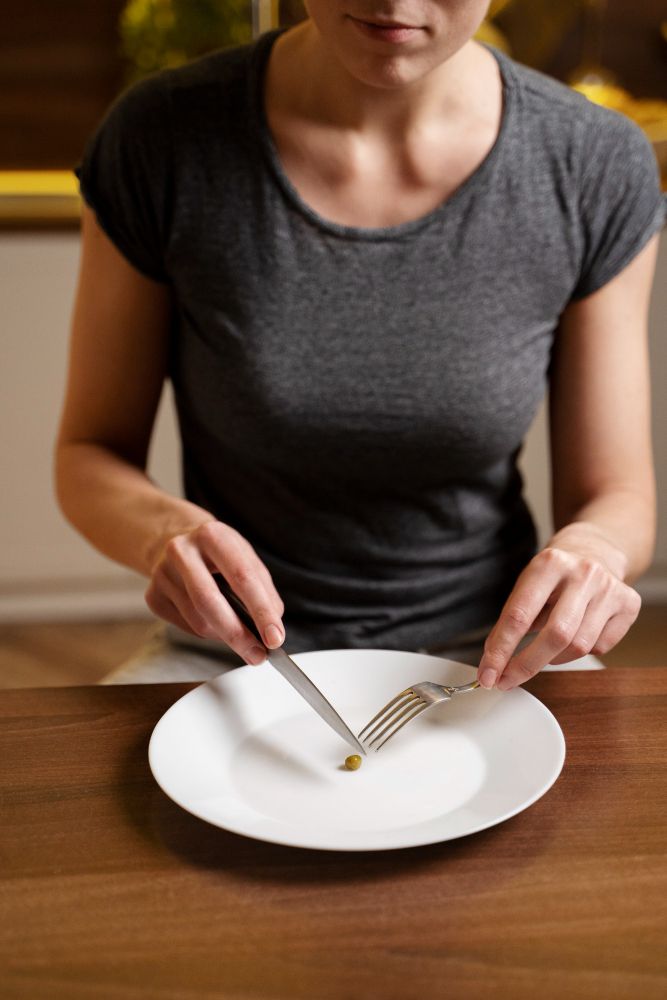 Mujer con trastorno alimentario